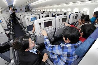 The Boeing 787 Soars above Sendai on a Flight to Encourage Reconstruction