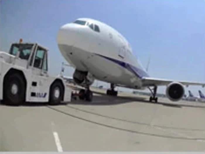 The aircraft departs.